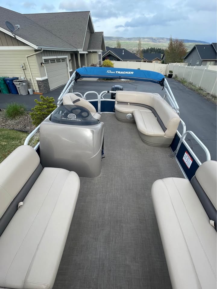 Float Fund deck — comfortable seating and blue SunTracker canopy